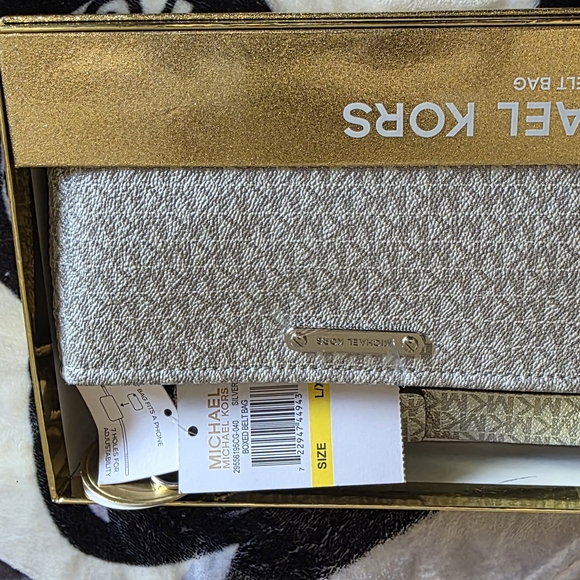 Michael Kors Handbags - Michael Kors Silver Waistbag.
